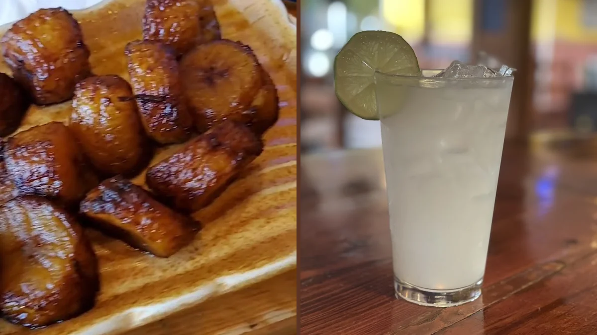 Colorful Dominican dishes on a restaurant table.
